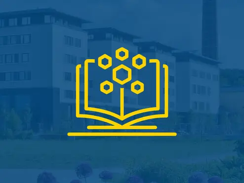 Buch mit anderen Symbolen vor blauem Hintergrund