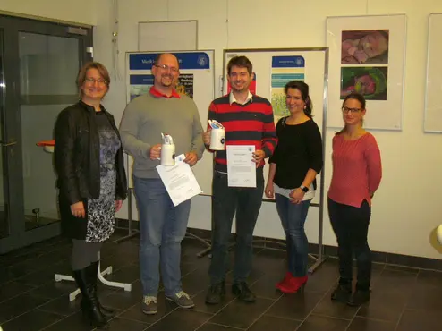 Awarding of the Faculty Award for Good Teaching to Simon Harrer and Michael Siebers by Dean of Studies Prof. Dr. Daniela Nicklas
